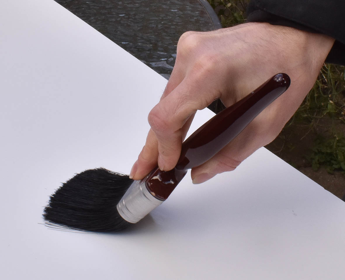 Sign painting with a brush