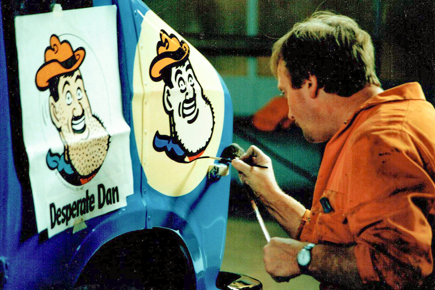 Signwriter in Tayside Buses around 1988