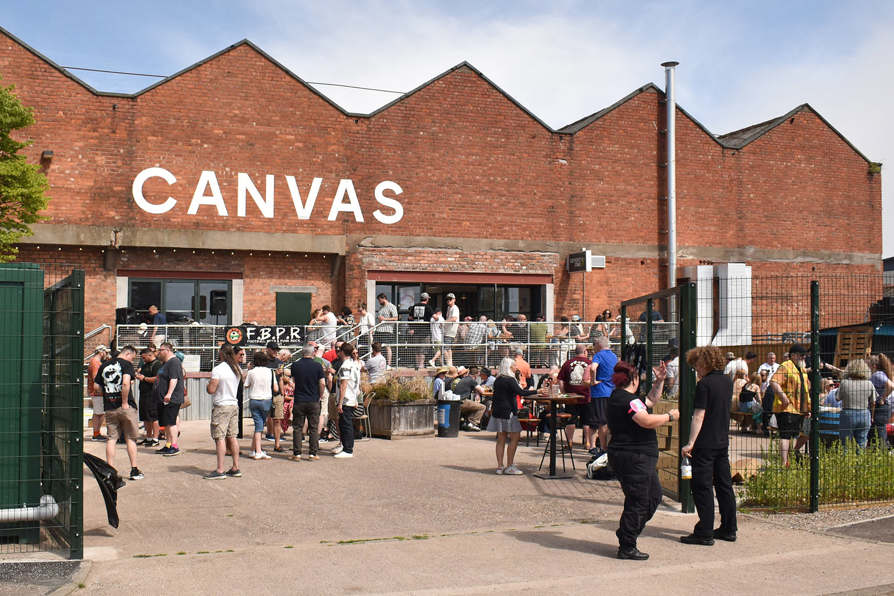 Canvas Dundee brick wall sign lettering