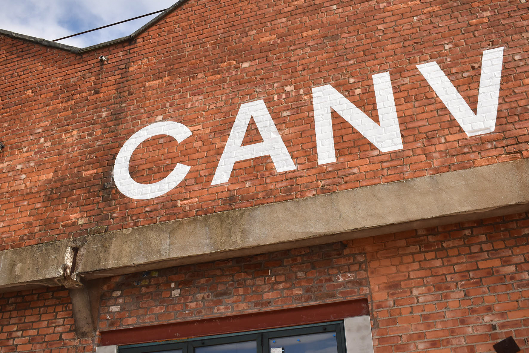 Large painted sign on wall in Dundee