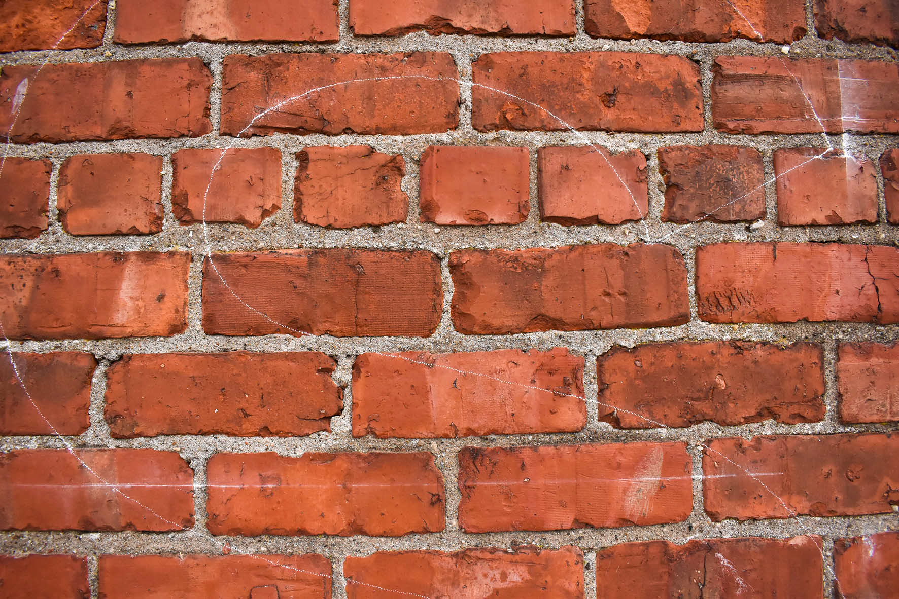 Transferring signs onto brick walls for business in Dundee