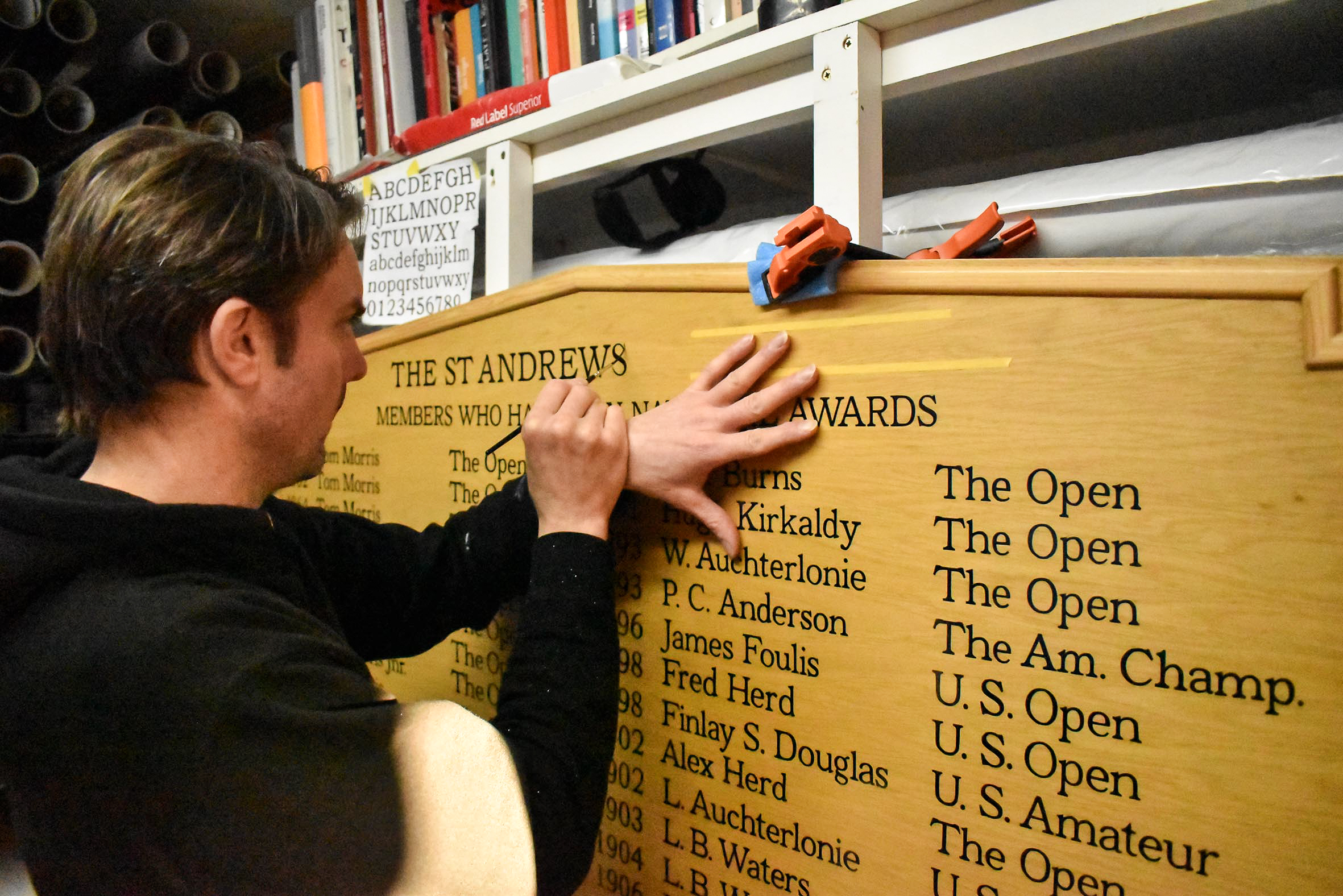 Hand painting an honours board
