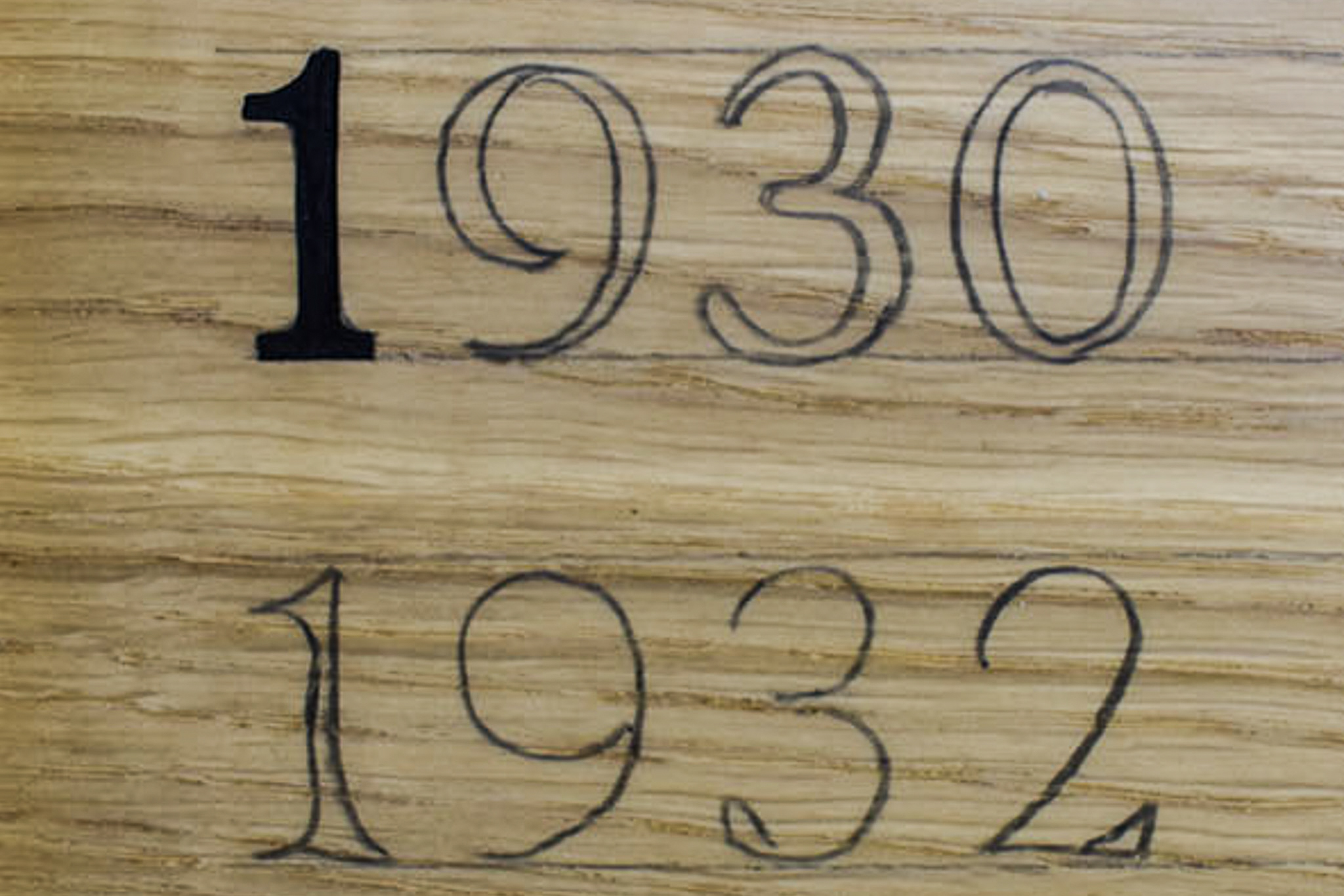 The first hand lettered numeral on an honours board