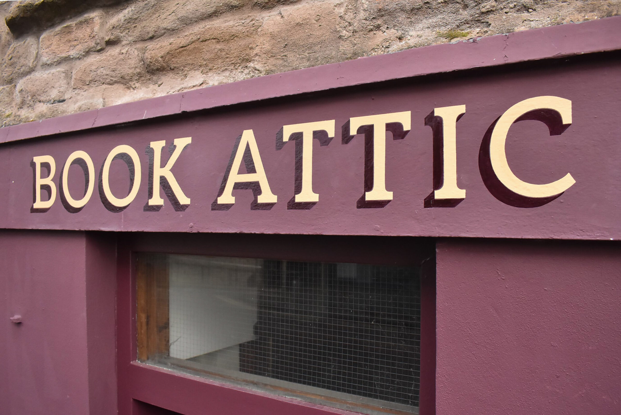 Hand lettering on shop fascia Perth Road Dundee