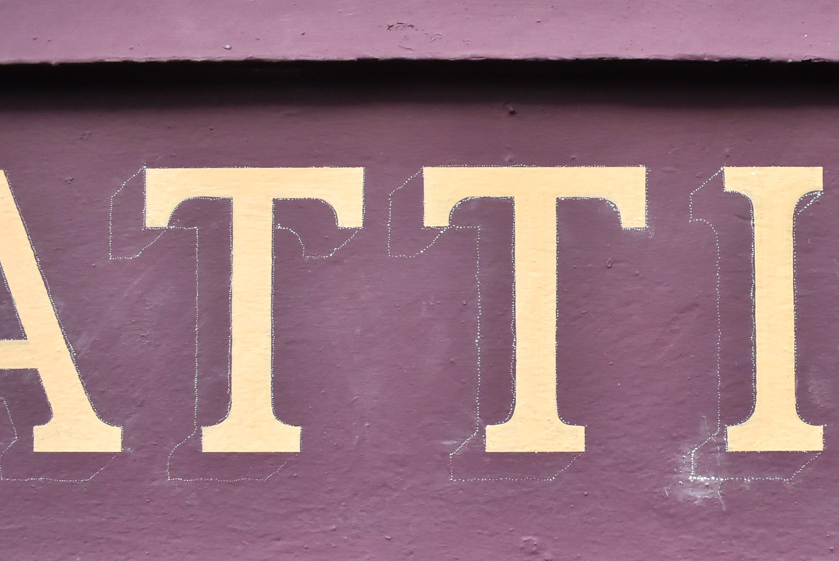 Signwriting a shopfront on Perth Road Dundee
