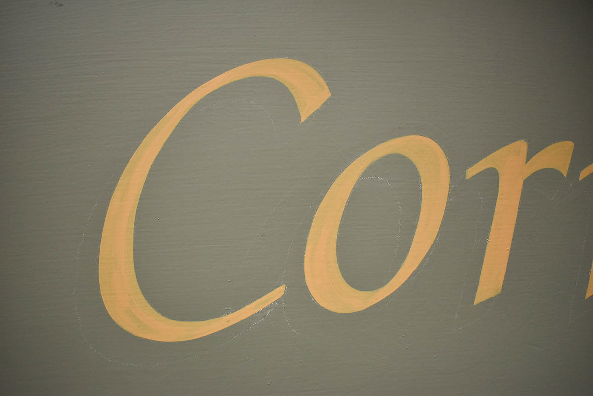 Calligraphic lettering on a shop sign in Blairgowrie High Street