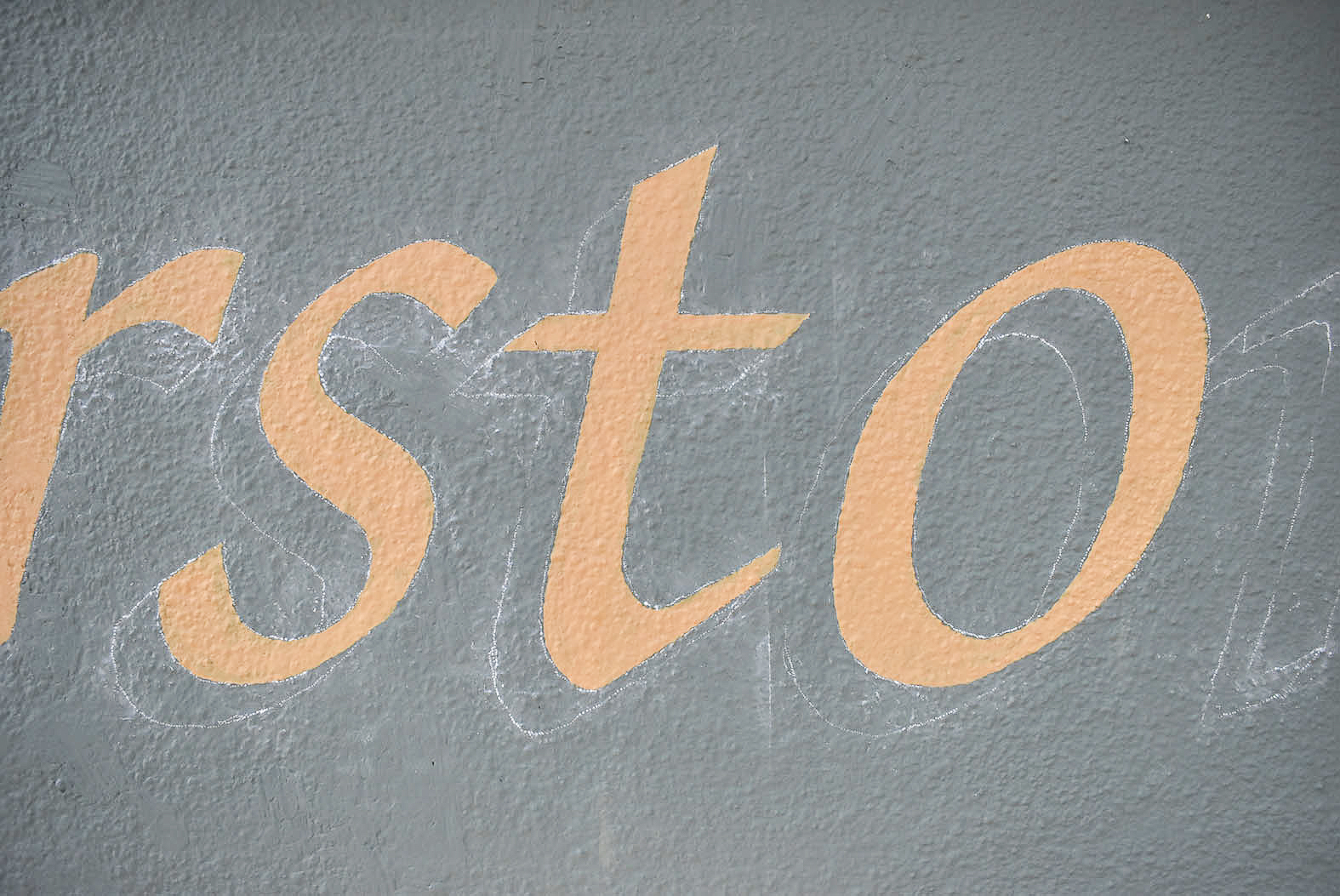 Hand painting signs on rough surfaces